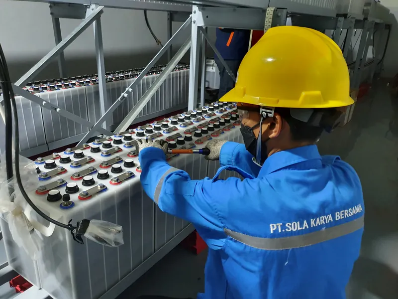 SKB technician installing an industrial battery bank