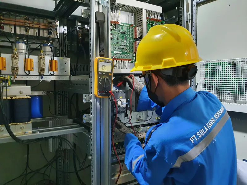 SKB engineer testing a battery charger control panel